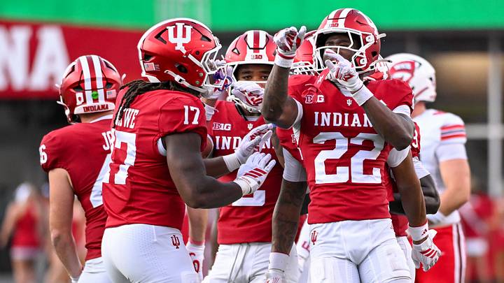 Sep 19, 2026; Bloomington, Indiana, USA; Indiana Hoosiers defensive lineman Daniel Ndukwe (17) and Indiana Hoosiers defensive back Jamari Sharpe (22) celebrate after a play against the Western Kentucky Hilltoppers during the second half at Merchants Bank Field at Memorial Stadium. Mandatory Credit: Robert Goddin-Imagn Images