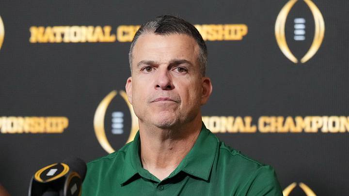 Jan 19, 2026; Miami Gardens, FL, USA; Miami Hurricanes head coach Mario Cristobal at press conference after 27-21 loss to the Indiana Hoosiers in the CFP National Championship college football game at Hard Rock Stadium. Mandatory Credit: Kirby Lee-Imagn Images