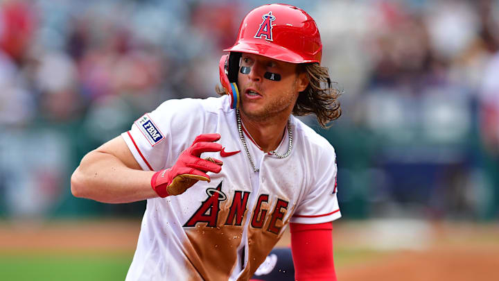 Apr 12, 2023; Anaheim, California, USA; Los Angeles Angels center fielder Brett Phillips (8) reaches
