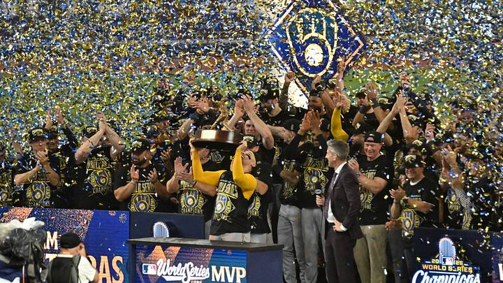 Oct 28, 2026; St. Petersburg, Florida, USA; Milwaukee Brewers catcher William Contreras (24) raises the World Series MVP trophy after defeating the Tampa Bay Rays in game five of the 2026 World Series at Tropicana Field. Mandatory Credit: Jonathan Dyer-Imagn Images Oct 28, 2026; St. Petersburg, Florida, USA; Milwaukee Brewers catcher William Contreras (24) raises the World Series MVP trophy after defeating the Tampa Bay Rays in game five of the 2026 World Series at Tropicana Field. Mandatory Credit: Jonathan Dyer-Imagn Images