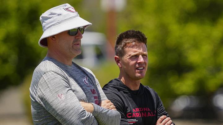 Arizona Cardinals general manager Monti Ossenfort (left) talks with head coach Mike LaFleur during organized team activities at the Cardinals Training Facility in Tempe on May 27, 2026. Arizona Cardinals general manager Monti Ossenfort (left) talks with head coach Mike LaFleur during organized team activities at the Cardinals Training Facility in Tempe on May 27, 2026.