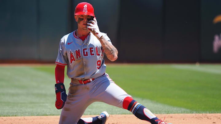 Jul 4, 2024; Oakland, California, USA; Los Angeles Angels shortstop Zach Neto (9) adjusts his helmet after stealing second base against the Oakland Athletics during the third inning at Oakland-Alameda County Coliseum. Mandatory Credit: Kelley L Cox-Imagn Images