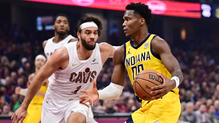 May 4, 2025; Cleveland, Ohio, USA; Indiana Pacers guard Bennedict Mathurin (00) drives to the basket against Cleveland Cavaliers guard Max Strus (1) during the first half in game one of the second round for the 2025 NBA Playoffs at Rocket Arena. Mandatory Credit: Ken Blaze-Imagn Images