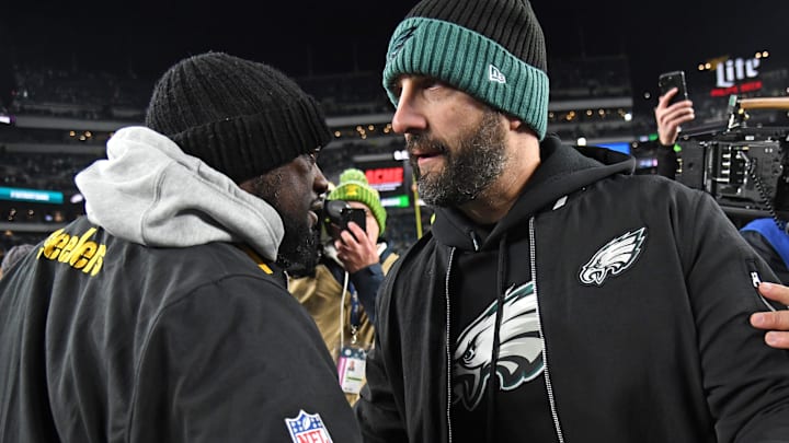 Dec 15, 2024; Philadelphia, Pennsylvania, USA; Pittsburgh Steelers head coach Mike Tomlin and Philadelphia Eagles head coach Nick Sirianni meet on the field after game at Lincoln Financial Field. Mandatory Credit: Eric Hartline-Imagn Images