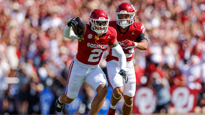 Oct 12, 2024; Dallas, Texas, USA; Oklahoma Sooners defensive back Billy Bowman Jr. (2) intercepts a pass during the first quarter against the Texas Longhorns at the Cotton Bowl. Mandatory Credit: Andrew Dieb-Imagn Images