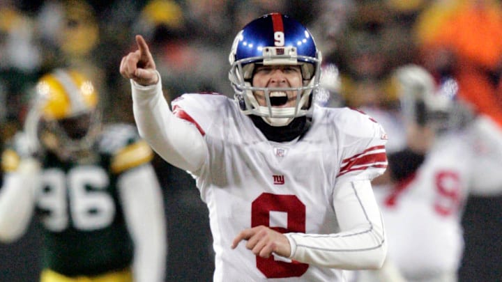 New York Giants kicker Lawrence Tynes sprints off the field after kicking the game-winning field goal in overtime to win the NFC Championship game against the Green Bay Packers Sunday, January 20, 2008 at Lambeau Field in Green Bay, Wis. New York Giants kicker Lawrence Tynes sprints off the field after kicking the game-winning field goal in overtime to win the NFC Championship game against the Green Bay Packers Sunday, January 20, 2008 at Lambeau Field in Green Bay, Wis.