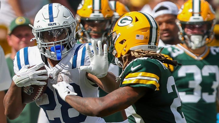 Indianapolis Colts running back Jonathan Taylor (28) stiff-arms Green Bay Packers safety Xavier McKinney (29) on Sunday, September 15, 2024, at Lambeau Field in Green Bay, Wis. The Packers won the game, 16-10.
Tork Mason/USA TODAY NETWORK-Wisconsin Indianapolis Colts running back Jonathan Taylor (28) stiff-arms Green Bay Packers safety Xavier McKinney (29) on Sunday, September 15, 2024, at Lambeau Field in Green Bay, Wis. The Packers won the game, 16-10.
Tork Mason/USA TODAY NETWORK-Wisconsin