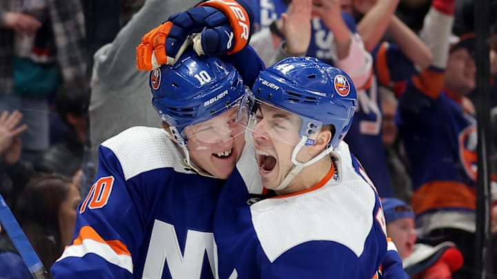 Dec 19, 2023; Elmont, New York, USA; New York Islanders right wing Simon Holmstrom (10) celebrates
