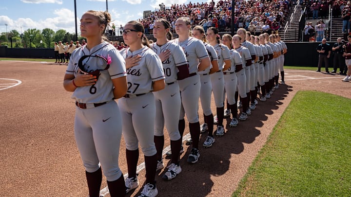 The Hokies stand down the third base line for the national anthem ahead of the final game of the 2025 regular season.