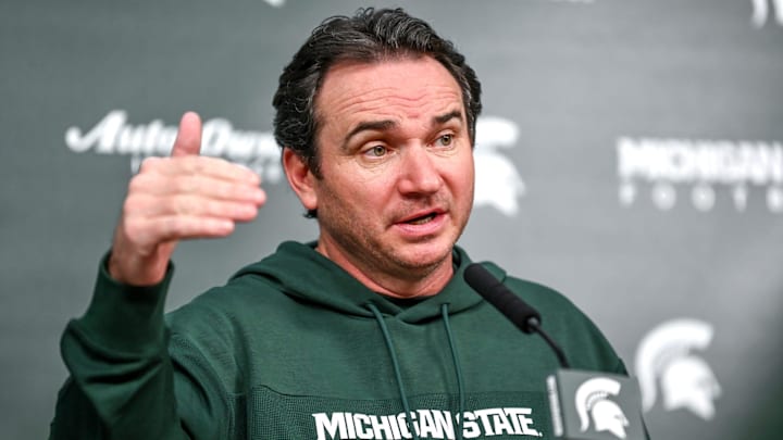 Michigan State coach Jonathan Smith talks the media on the first national signing day for college