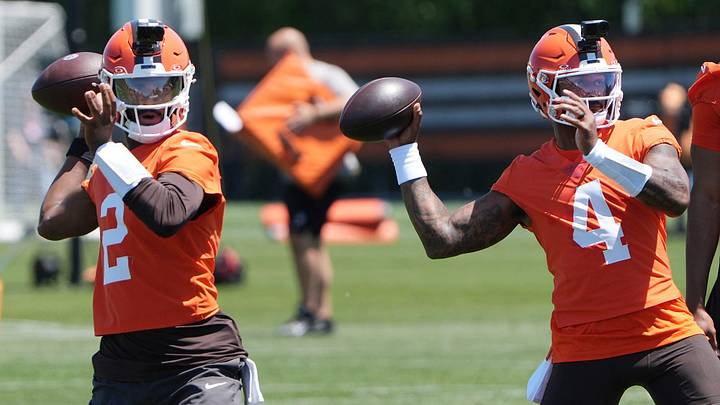Cleveland Browns quarterbacks Shedeur Sanders and Deshaun Watson take part in a passing drill during team OTAs at CrossCountry Mortgage Campus of the Cleveland Browns in Berea, Ohio on June 2, 2026.