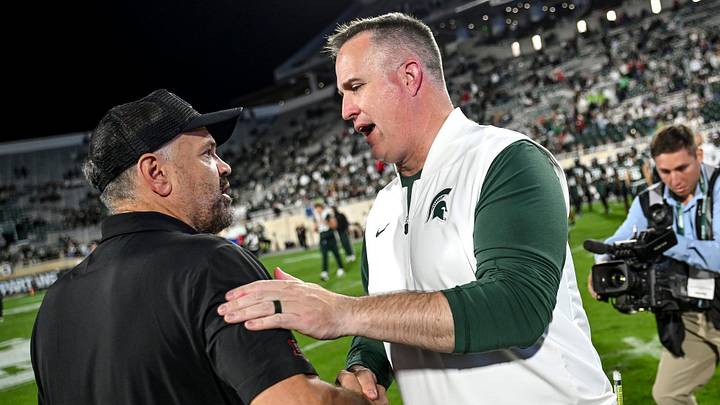 Michigan State’s head coach Pat Fitzgerald, right, shakes hands with Nebraska head coach Matt Rhule after the game on Saturday, Sept. 26, 2026, in East Lansing. Michigan State’s head coach Pat Fitzgerald, right, shakes hands with Nebraska head coach Matt Rhule after the game on Saturday, Sept. 26, 2026, in East Lansing.
