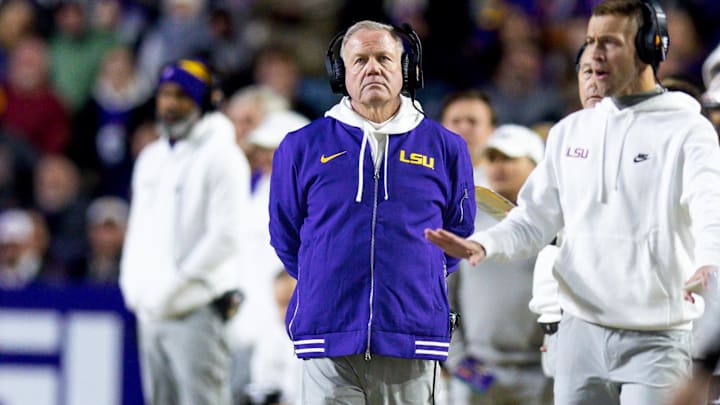 Nov 30, 2024; Baton Rouge, Louisiana, USA; LSU Tigers head coach Brian Kelly looks on against the Oklahoma Sooners during the second quarter at Tiger Stadium. Mandatory Credit: Stephen Lew-Imagn Images Nov 30, 2024; Baton Rouge, Louisiana, USA; LSU Tigers head coach Brian Kelly looks on against the Oklahoma Sooners during the second quarter at Tiger Stadium. Mandatory Credit: Stephen Lew-Imagn Images