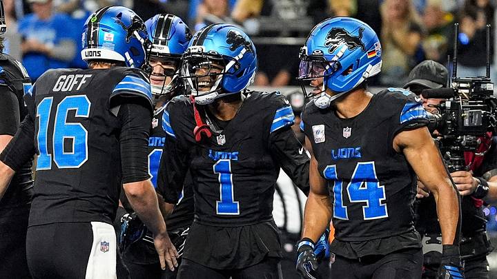 Detroit Lions wide receiver Jameson Williams (1) celebrates a touchdown against Green Bay Packers with quarterback Jared Goff (16) during the second half at Ford Field in Detroit on Sunday, Oct. 25, 2026.