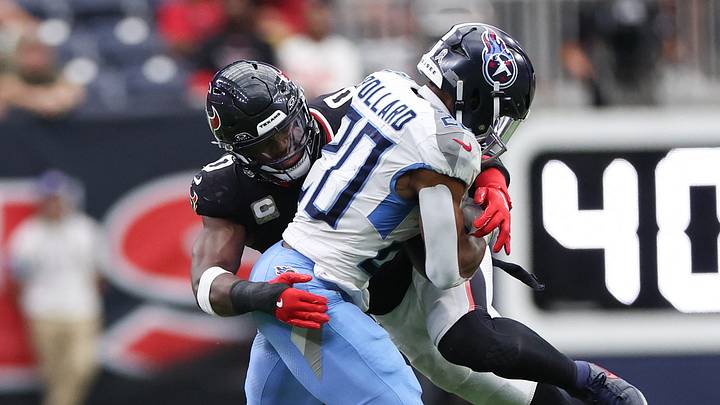 Nov 24, 2024; Houston, Texas, USA; Tennessee Titans running back Tony Pollard (20) is tackled by Houston Texans linebacker Azeez Al-Shaair (0) in the fourth quarter at NRG Stadium. Mandatory Credit: Thomas Shea-Imagn Images Nov 24, 2024; Houston, Texas, USA; Tennessee Titans running back Tony Pollard (20) is tackled by Houston Texans linebacker Azeez Al-Shaair (0) in the fourth quarter at NRG Stadium. Mandatory Credit: Thomas Shea-Imagn Images