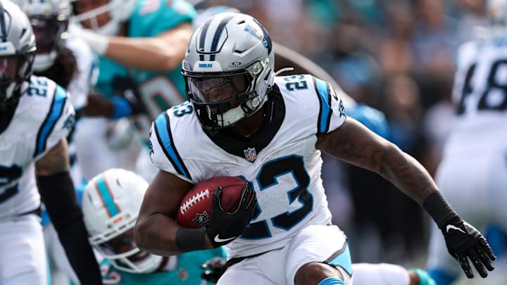 Oct 5, 2025; Charlotte, North Carolina, USA; Carolina Panthers running back Trevor Etienne (23) carries the ball during the fourth quarter against the Miami Dolphins at Bank of America Stadium. Oct 5, 2025; Charlotte, North Carolina, USA; Carolina Panthers running back Trevor Etienne (23) carries the ball during the fourth quarter against the Miami Dolphins at Bank of America Stadium.