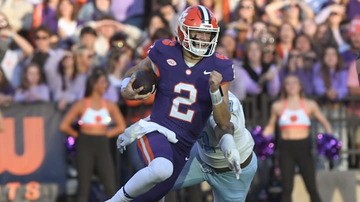 Nov 23, 2024; Clemson, South Carolina, USA; Clemson Tigers quarterback Cade Klubnik (2) runs for a first down against The Citadel Bulldogs during the second quarter at Memorial Stadium. 