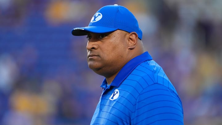 Sep 20, 2025; Greenville, North Carolina, USA; Brigham Young Cougars head coach Kalani Sitake looks on before the game against the East Carolina Pirates at Dowdy-Ficklen Stadium. Mandatory Credit: James Guillory-Imagn Images Sep 20, 2025; Greenville, North Carolina, USA; Brigham Young Cougars head coach Kalani Sitake looks on before the game against the East Carolina Pirates at Dowdy-Ficklen Stadium. Mandatory Credit: James Guillory-Imagn Images