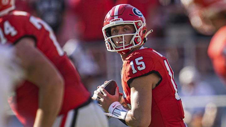 Oct 12, 2024; Athens, Georgia, USA; Georgia Bulldogs quarterback Carson Beck (15) rolls out against the Mississippi State Bulldogs during the first half at Sanford Stadium. Mandatory Credit: Dale Zanine-Imagn Images