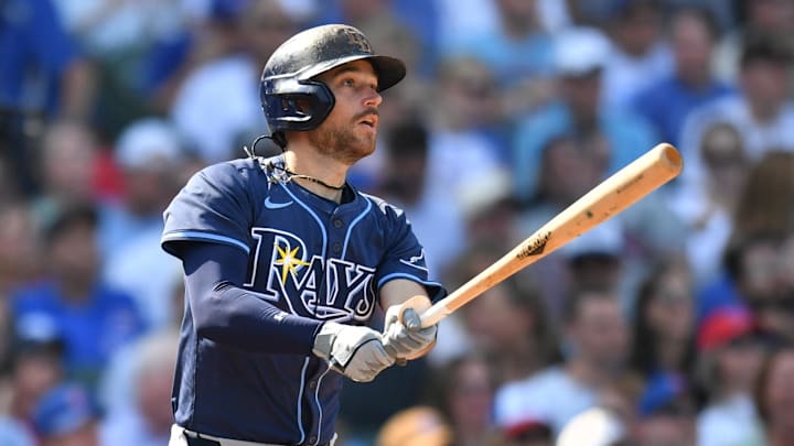 Sep 13, 2025; Chicago, Illinois, USA; Tampa Bay Rays second baseman Brandon Lowe (8) hits an RBI single against the Chicago Cubs during the sixth inning at Wrigley Field. Mandatory Credit: Patrick Gorski-Imagn Images