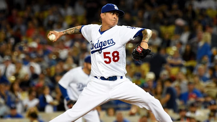 Aug 5, 2016; Los Angeles, CA, USA;  Los Angeles Dodgers relief pitcher Jesse Chavez (58) in the eighth inning of the game against the Boston Red Sox at Dodger Stadium. Mandatory Credit: Jayne Kamin-Oncea-Imagn Images
