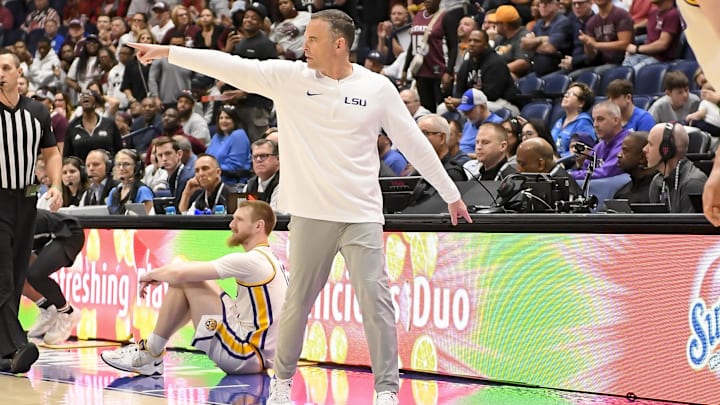 Mar 14, 2024; Nashville, TN, USA; LSU Tigers head coach Matt McMahon calls out the defense against the Mississippi State Bulldogs during the second half at Bridgestone Arena. Mandatory Credit: Steve Roberts-Imagn Images Mar 14, 2024; Nashville, TN, USA; LSU Tigers head coach Matt McMahon calls out the defense against the Mississippi State Bulldogs during the second half at Bridgestone Arena. Mandatory Credit: Steve Roberts-Imagn Images