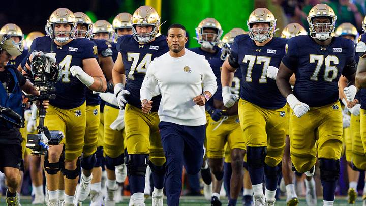 Notre Dame head coach Marcus Freeman leads the team onto the field before a NCAA football game against Michigan State at Notre Dame Stadium on Saturday, Sept. 19, 2026, in South Bend. Notre Dame head coach Marcus Freeman leads the team onto the field before a NCAA football game against Michigan State at Notre Dame Stadium on Saturday, Sept. 19, 2026, in South Bend.