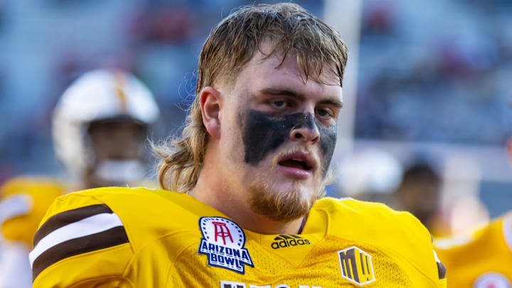 Dec 30, 2022; Tucson, AZ, USA; Wyoming Cowboys offensive tackle Caden Barnett (72) against the Ohio Bobcats during the 2022 Barstool Sports Arizona Bowl at Arizona Stadium. Mandatory Credit: Mark J. Rebilas-Imagn Images Dec 30, 2022; Tucson, AZ, USA; Wyoming Cowboys offensive tackle Caden Barnett (72) against the Ohio Bobcats during the 2022 Barstool Sports Arizona Bowl at Arizona Stadium. Mandatory Credit: Mark J. Rebilas-Imagn Images