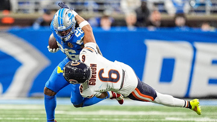 Chicago Bears cornerback Kyler Gordon (6) tackles Detroit Lions running back Jahmyr Gibbs (26) during the second half at Ford Field in Detroit on Thursday, Nov. 28, 2024. Chicago Bears cornerback Kyler Gordon (6) tackles Detroit Lions running back Jahmyr Gibbs (26) during the second half at Ford Field in Detroit on Thursday, Nov. 28, 2024.