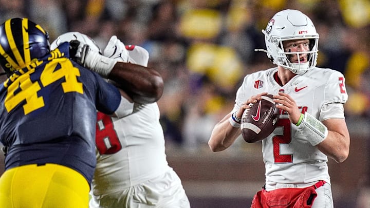 New Mexico quarterback Jack Layne (2) looks before making a pass against Michigan during the first half at Michigan Stadium in Ann Arbor on Saturday, August 30, 2025.