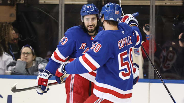 Apr 17, 2025; New York, New York, USA;  New York Rangers center Mika Zibanejad (93) celebrates with left wing Will Cuylle (50) after scoring a goal in the third period against the Tampa Bay Lightning at Madison Square Garden. Mandatory Credit: Wendell Cruz-Imagn Images