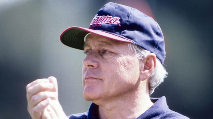 Sep 24, 1994; Stanford, CA, USA; FILE PHOTO; Arizona Wildcats head coach Dick Tomey clapping his hands during the game against the Stanford Cardinal at Stanford Stadium. Mandatory Credit: Imagn Images Sep 24, 1994; Stanford, CA, USA; FILE PHOTO; Arizona Wildcats head coach Dick Tomey clapping his hands during the game against the Stanford Cardinal at Stanford Stadium. Mandatory Credit: Imagn Images