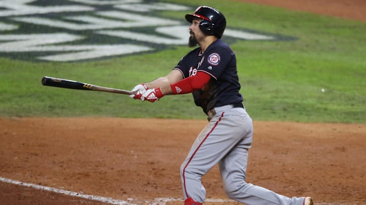 Oct 30, 2019; Houston, TX, USA; Washington Nationals third baseman Anthony Rendon (6) hits a solo home run against the Houston Astros during the seventh inning in game seven of the 2019 World Series at Minute Maid Park.