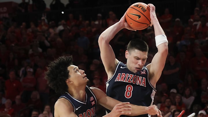 Feb 21, 2026; Houston, Texas, USA; Arizona Wildcats forward Ivan Kharchenkov (8) grabs a defensive rebound against the Houston Cougars in the second half at Fertitta Center. Mandatory Credit: Thomas Shea-Imagn Images Feb 21, 2026; Houston, Texas, USA; Arizona Wildcats forward Ivan Kharchenkov (8) grabs a defensive rebound against the Houston Cougars in the second half at Fertitta Center. Mandatory Credit: Thomas Shea-Imagn Images