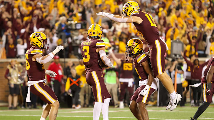 Oct 5, 2024; Minneapolis, Minnesota, USA; Minnesota Golden Gophers defensive back Koi Perich (3) celebrates his interception during the second half against the USC Trojans at Huntington Bank Stadium.