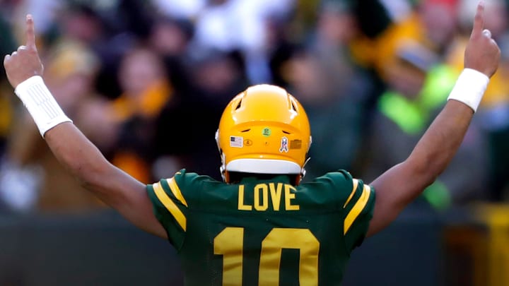 Green Bay Packers quarterback Jordan Love (10)reacts following a fourth quarter touchdown against