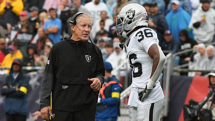 Sep 7, 2025; Foxborough, Massachusetts, USA; Las Vegas Raiders head coach Pete Carroll talks with cornerback Kyu Blu Kelly (36) at Gillette Stadium. Mandatory Credit: Bob DeChiara-Imagn Images