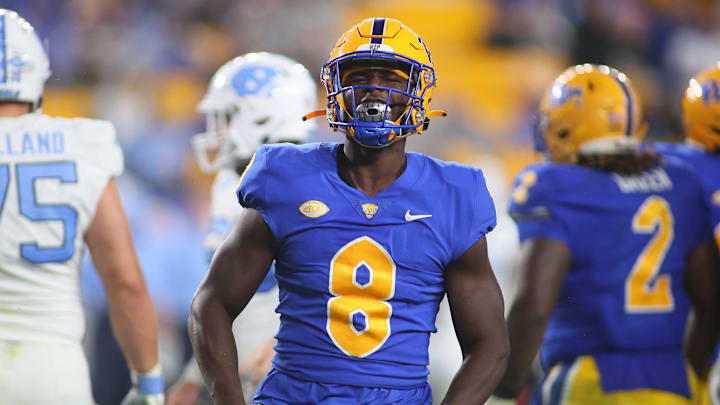 Pittsburgh Panthers Samuel Okunlola (8) reacts after sacking North Carolina Tar Heels Drake Maye during the first half at Acrisure Stadium in Pittsburgh, PA on September 23, 2023.