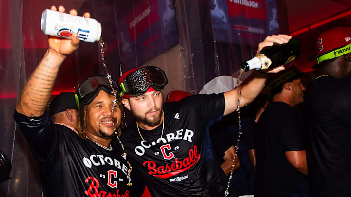 Sep 27, 2025: Cleveland Guardians third baseman Jose Ramirez (11) and starting pitcher Slade Cecconi (44) celebrate after the Guardians beat the Texas Rangers and clinched a playoff berth at Progressive Field. Sep 27, 2025: Cleveland Guardians third baseman Jose Ramirez (11) and starting pitcher Slade Cecconi (44) celebrate after the Guardians beat the Texas Rangers and clinched a playoff berth at Progressive Field.