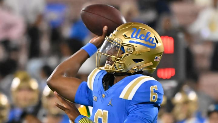 Sep 28, 2024; Pasadena, California, USA; UCLA Bruins quarterback Justyn Martin (6) throws a pass during the fourth quarter against the Oregon Ducks at Rose Bowl. Mandatory Credit: Robert Hanashiro-Imagn Images