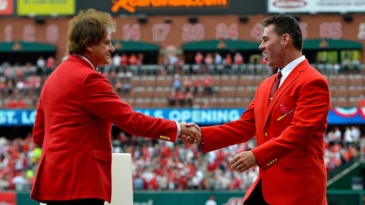 Apr 13, 2015; St. Louis, MO, USA; St. Louis Cardinals former manager Tony Larussa shakes hands with former player Jim Edmonds before the game between the St. Louis Cardinals and the Milwaukee Brewers at Busch Stadium. 