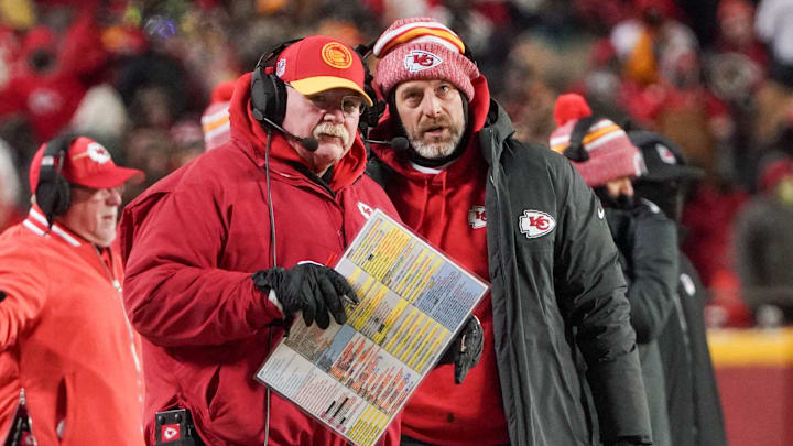 Jan 13, 2024; Kansas City, Missouri, USA; Kansas City Chiefs head coach Andy Reid  talks with offensive coordinator Matt Nagy (right) against the Miami Dolphins  in a 2024 AFC wild card game at GEHA Field at Arrowhead Stadium. Mandatory Credit: Denny Medley-Imagn Images