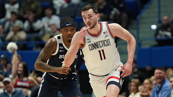 Jan 21, 2025; Storrs, Connecticut, USA; UConn Huskies forward Alex Karaban (11) reacts after his three point basket against Butler Bulldogs forward Jahmyl Telfort (11) in the first half at Harry A. Gampel Pavilion. Mandatory Credit: David Butler II-Imagn Images Jan 21, 2025; Storrs, Connecticut, USA; UConn Huskies forward Alex Karaban (11) reacts after his three point basket against Butler Bulldogs forward Jahmyl Telfort (11) in the first half at Harry A. Gampel Pavilion. Mandatory Credit: David Butler II-Imagn Images