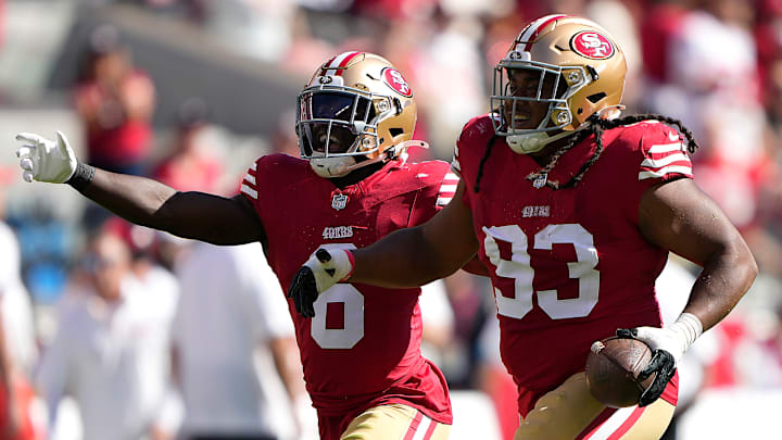 San Francisco 49ers safety Malik Mustapha (L) and defensive tackle Kalia Davis (R)