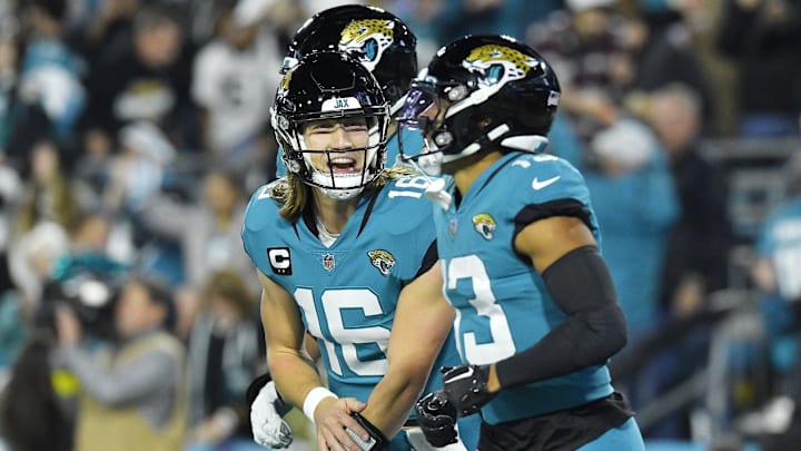 Jacksonville Jaguars quarterback Trevor Lawrence (16) celebrates with teammate wide receiver Christian Kirk (13) after his touchdown catch during second quarter action. The Jacksonville Jaguars hosted the Tennessee Titans to decide the AFC South championship at TIAA Bank Field in Jacksonville, FL, Saturday, January 7, 2023. The Jaguars went into the half trailing 7 to 13. Jacksonville Jaguars quarterback Trevor Lawrence (16) celebrates with teammate wide receiver Christian Kirk (13) after his touchdown catch during second quarter action. The Jacksonville Jaguars hosted the Tennessee Titans to decide the AFC South championship at TIAA Bank Field in Jacksonville, FL, Saturday, January 7, 2023. The Jaguars went into the half trailing 7 to 13.