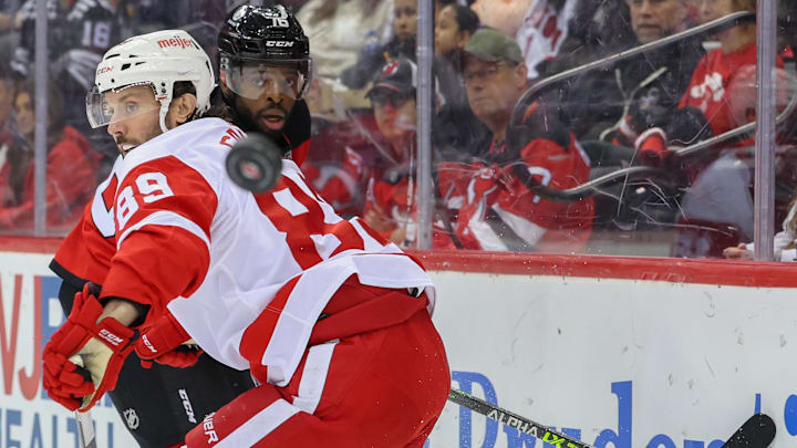 Apr 24, 2022; Newark, New Jersey, USA; New Jersey Devils defenseman P.K. Subban (76) plays the puck away from Detroit Red Wings center Sam Gagner (89) during the first period at Prudential Center. Mandatory Credit: Ed Mulholland-Imagn Images