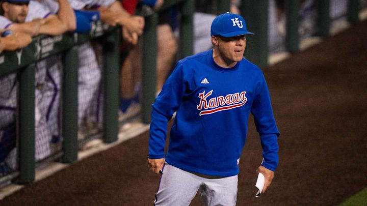 Kansas Jayhawks' Head Coach Dan Fitzgerald exchanges words with the officials before being ejected from the game in sixth inning of the Longhorns' game against the Kansas Jayhawks, Thursday, May 16, 2024 at UFCU Disch-Falk Field in Austin.