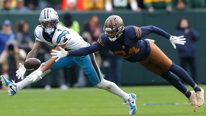 Green Bay Packers cornerback Carrington Valentine (24) breaks up a pass to Carolina Panthers wide receiver Tetairoa McMillan (4) on Sunday, November 2, 2025, at Lambeau Field in Green Bay, Wis. Carolina defeated Grewen Bay 16-13.
Wm. Glasheen USA TODAY NETWORK-Wisconsin