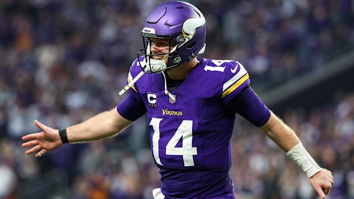 Dec 8, 2024; Minneapolis, Minnesota, USA; Minnesota Vikings quarterback Sam Darnold (14) celebrates running back Aaron Jones' (33) touchdown run against the Atlanta Falcons during the fourth quarter at U.S. Bank Stadium. Dec 8, 2024; Minneapolis, Minnesota, USA; Minnesota Vikings quarterback Sam Darnold (14) celebrates running back Aaron Jones' (33) touchdown run against the Atlanta Falcons during the fourth quarter at U.S. Bank Stadium.