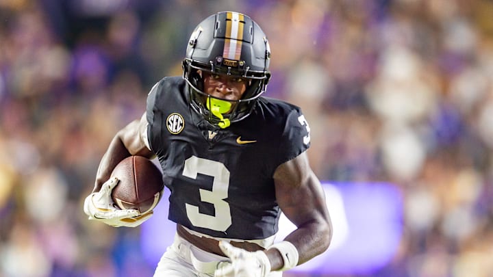Quincy Skinner Jr. 3 scores a touchdown as the LSU Tigers take on the Vanderbilt Commodores. Nov 23, 2024; Baton Rouge, Louisiana, USA; at Tiger Stadium.